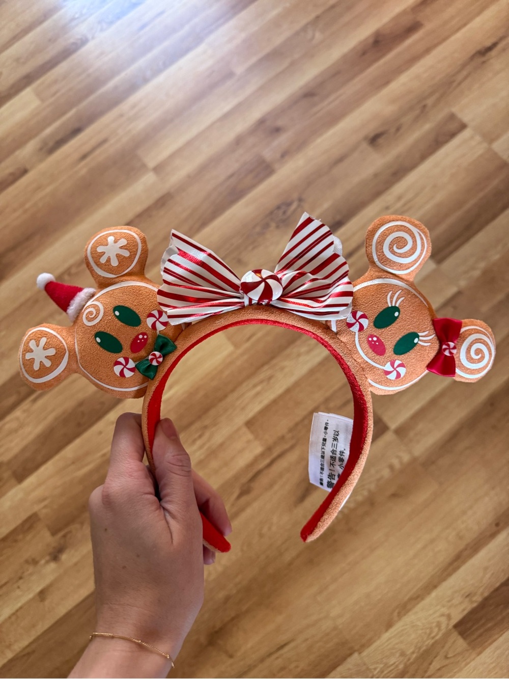 Disney Orange Gingerbread Minnie Ear Headband with Red & White Bow